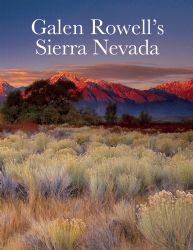 a book cover with an image of mountains in the background and grass on the ground