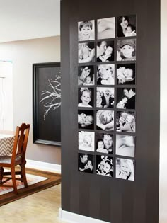 a black and white photo collage on the wall next to a table with chairs