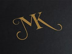 a black book with gold lettering on the front and back cover that says mj