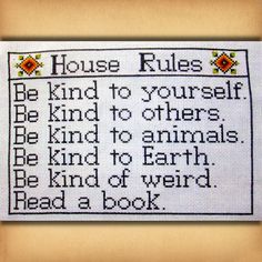 a cross stitch pattern with the words house rules and an image of a cat on it