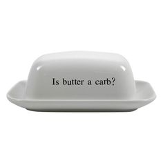 a white dish with the words is butter a carb? written in black on it