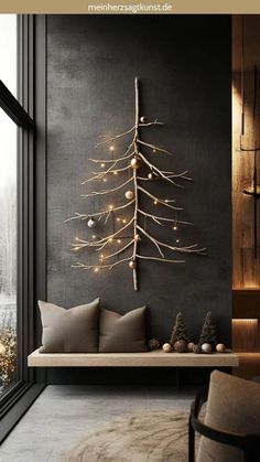 a living room with a christmas tree on the wall and lights hanging from the ceiling