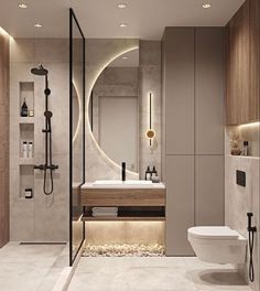 a bathroom with a toilet, sink and shower stall in it's center area