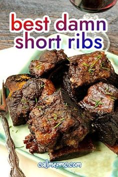 the best damn short ribs recipe is served on a plate with a glass of wine