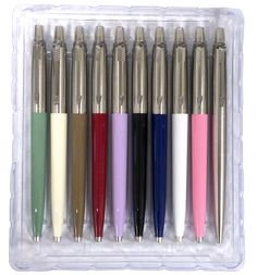 six different colored pens in a plastic container