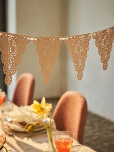 an image of a table setting with flowers