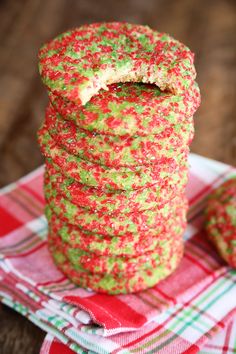 green and red sprinkled cookies stacked on top of each other