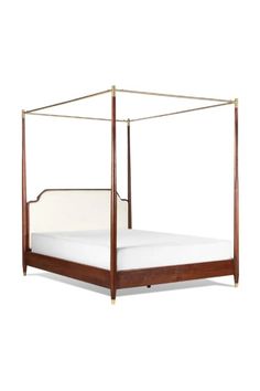 a bed that has a white sheet on the top and bottom with a wooden frame