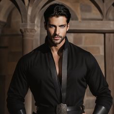 a man in black shirt and leather belt