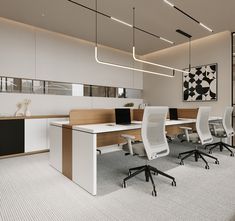 an office cubicle with white and wood furniture