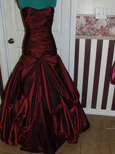 This is a custom made taffeta gown.  It is made to the specifications of each customer as ordered.   It is made of  taffeta, but can be created in another fabric of your choosing..  The bodice is boned for added support and the gown is fully lined.  The back is a corset style and the skirt has pick-ups for fullness. If made in silk taffeta, there will be an additional cost of $350.00. This gown is made of 13 yards of the taffeta and habotai lining. Gown show with very full crinoline.  Crinoline is not included, but  can be added for a price of $85.00. Please allow 6-8 weeks for completion of the gown. If you are interested in a custom made gown in any style, please contact me and send a picture of what you are wanting and I will send you a quote for creating it.    VAT Fees or Any other fe Taffeta Wedding Dress With Sweep Train, Wedding Dress With Sweep Train In Taffeta, Taffeta Ball Gown Wedding Dress, Taffeta Wedding Dress With Sweetheart Neckline, Taffeta Dress With Fitted Bodice, Floor-length, Wedding Taffeta Dress With Sweetheart Neckline, Wedding Dress With Sweetheart Neckline In Taffeta, Floor-length Taffeta Wedding Dress, Fitted Taffeta Dress With Satin Finish