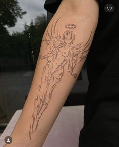 a person with a tattoo on their arm