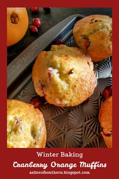 orange muffins with cranberries on a plate