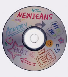 a cd with some stickers on it and the words written in different languages are shown