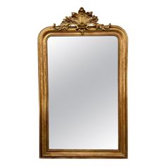 an ornate gold framed mirror with leaves on it's edge, against a white background