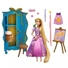 a barbie doll standing in front of a painting easel with princess hair and makeup