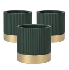 two green and gold vases sitting next to each other