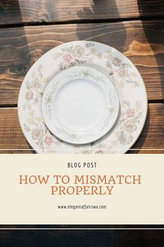 a white plate sitting on top of a wooden table