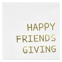 a card with the words happy friends giving written in gold foil on white cardstock