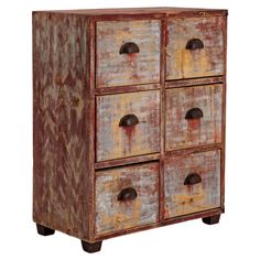 an old wooden cabinet with four drawers