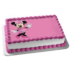 a minnie mouse cake with pink frosting