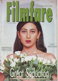 a magazine cover with a woman holding flowers