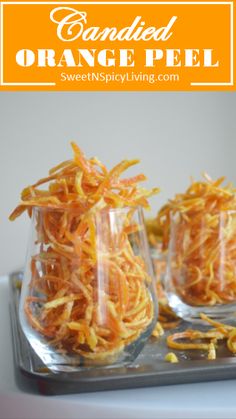 candied orange peels in small glass cups on a tray with text overlay