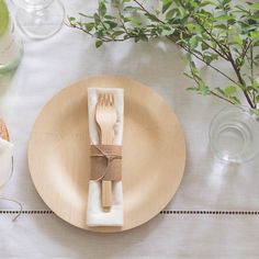 a plate with a napkin and fork on it