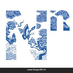 the letter n is made up of blue and white paper with flowers, butterflies and clouds