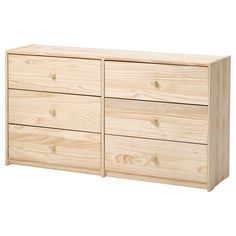 a wooden dresser with four drawers and no doors