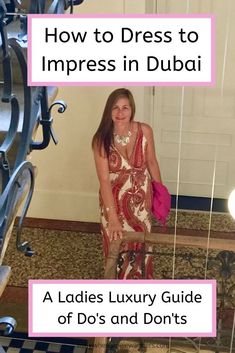 a woman in a dress standing next to stairs with the words how to dress to impress in dubai