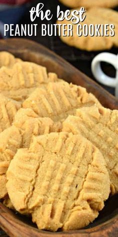 peanut butter cookies in a wooden bowl with the words, the best peanut butter cookies