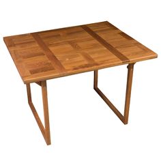 a small wooden table with two legs and a square shaped design on the top, made out of wood