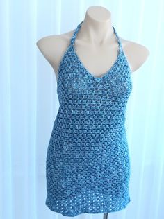 READY TO SHIP NOW Blue sparkly lacy crochet body con dress, cocktail dress, festival dress, party dress.  Please make sure to check your own measurements against the model's measurements before buying. This dress will fit size  8 to 10 in Australian sizes. ( stretches up to 2cm) depending on how tight you like to wear your dresses. FIND MORE DRESSES HERE: https://www.etsy.com/your/shops/me/tools/listings/section:41165872,sort:title,order:ascending,stats:true MODEL'S MEASUREMENTS:   Bust- 87cm. U Fitted Mini Crochet Dress For Beach Cover-up, Fitted Sundress For Beach Cover-up, Stretch Halter Neck Backless Dress For Beach, Beach Stretch Halter Neck Backless Dress, Summer Stretch Beach Dress For Party, Summer Beach Dress For Party With Stretch, Fitted Backless Mini Dress For Beach Party, Summer Party Beach Dress With Stretch, Bohemian Stretch Dress For Beach Party