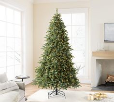 a living room with a christmas tree in the corner