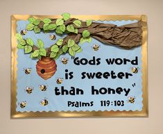 a bulletin board with a beehive hanging from it's side and the words, god's word is sweeter than honey