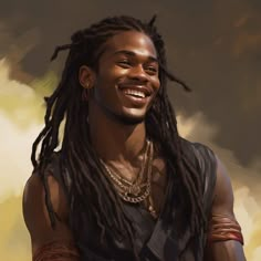 a man with dreadlocks smiling and wearing a gold chain around his neck necklace