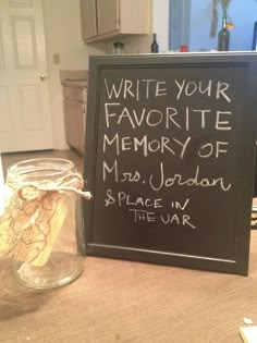 a chalkboard sign with writing on it next to a jar filled with wine corks