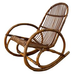 a wicker rocking chair is shown against a white background