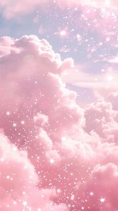 the sky is full of stars and clouds with pink hues on it, as well as white fluffy clouds