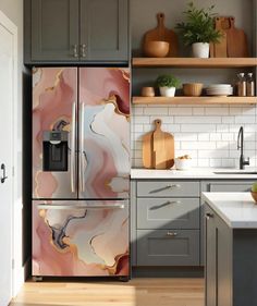 a kitchen with gray cabinets and marbled refrigerator freezer next to open shelves on the wall