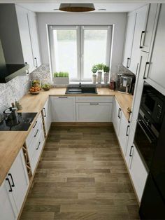 the kitchen is clean and ready for us to use in its new owner's home