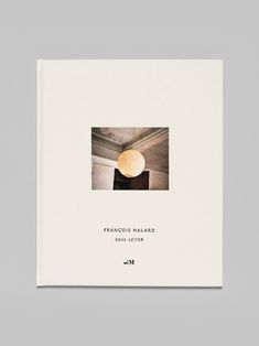 a book with an image of a lamp hanging from the ceiling