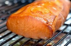 a piece of meat sitting on top of a grill