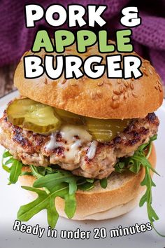 an advertisement for pork and apple burger on a plate