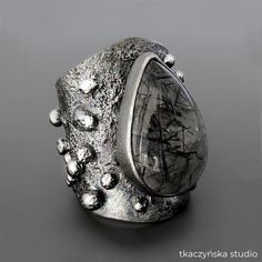 This Statement Rings item by TkaczynskaStudio has 63 favorites from Etsy shoppers. Ships from Poland. Listed on Mar 5, 2024 Big Gem Ring, Brass Rings Jewelry, Silversmith Jewelry, Wide Wedding Rings, Sculptural Ring, Silversmith Jewellery, Tourmaline Quartz, Silver Clay, Power Ring