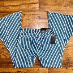 Lucky & Blessed Size 10 Bell Bottoms Hippy Blue/Striped Denim Jeans New W/Tags. Details: 1.) Waist: 32” Inches 2.) Inseam: 33” Inches 3.) Leg Opening: 17” Inches 4.) Front Rise: 8” Inches 5.) Thigh: 22” Inches 6.) Hip: 40” Inches 7.) 68% Cotton; 3% Spandex; 29% Polyester 8.) Machine Wash 9.) 2 Front & 3 Back Pockets 10.) Zipper & Button For Closure 11.) Size 10 12.) Made In China Thanks For Looking & Please Look At My Listings For More Clothes. Casual Striped Stretch Jeans, Casual Stretch Striped Jeans, Fitted Striped Denim Jeans, Striped Fitted Cotton Jeans, Striped Mid-rise Denim Jeans, Trendy Striped Denim Jeans, Spring Striped Stretch Jeans, Striped Denim, Bell Bottoms