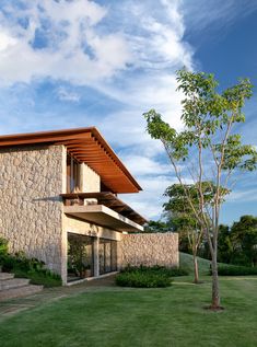 an exterior view of a modern home in the countryside