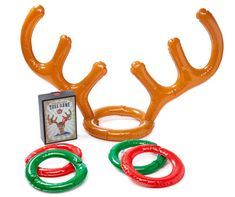 two plastic antlers and three rings on a white background with an advertise card