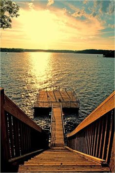 stairs lead down to the water from a dock